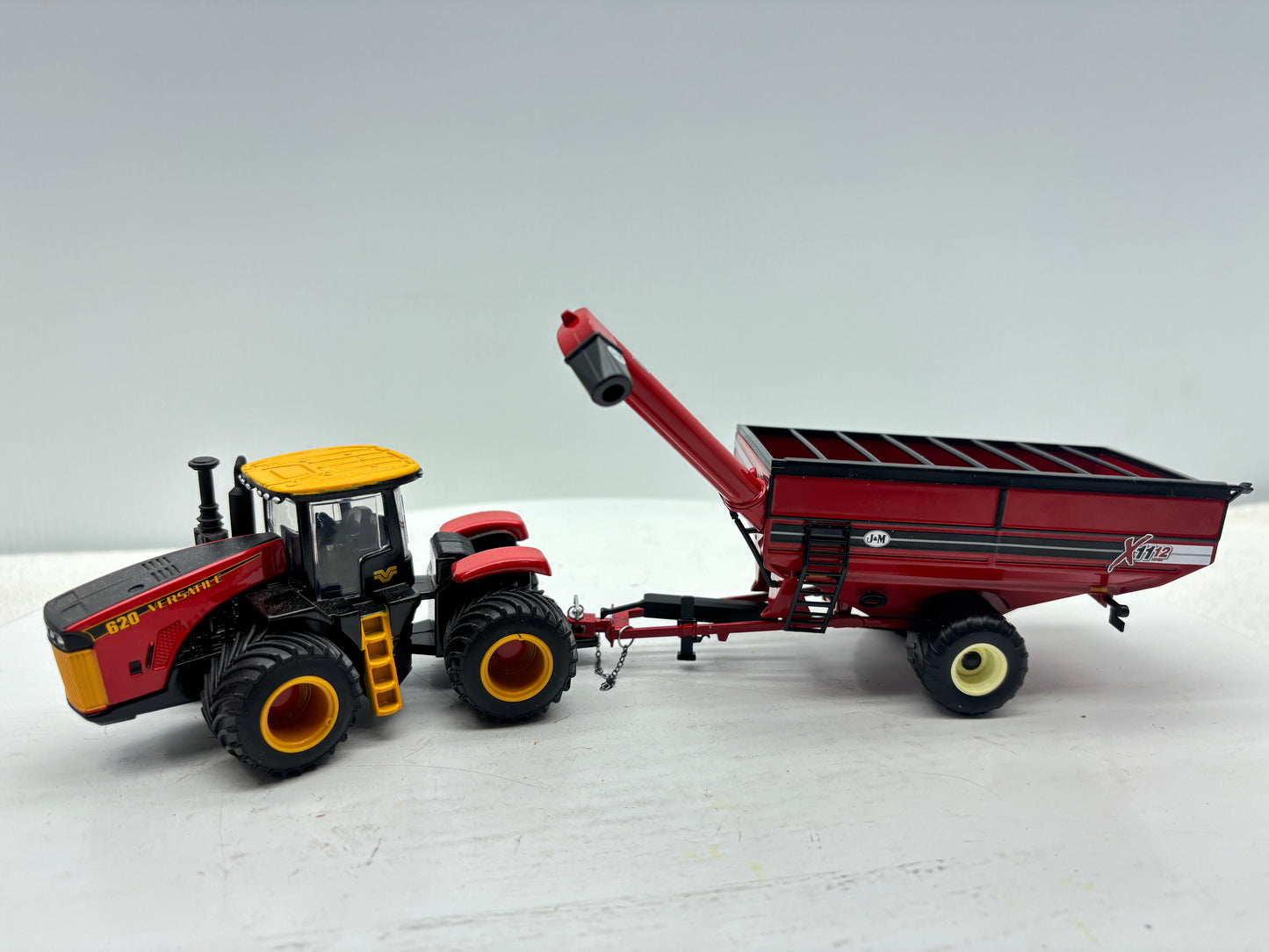 1/64 J&M 1112 X-Tend Flotation Red Singles