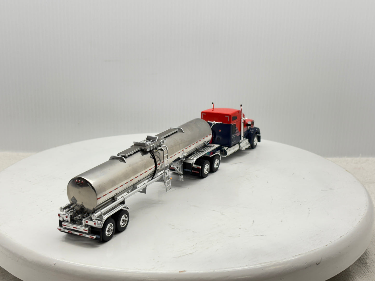 1/64 Kenworth W990 76'' Midroof (Orange-Blue)