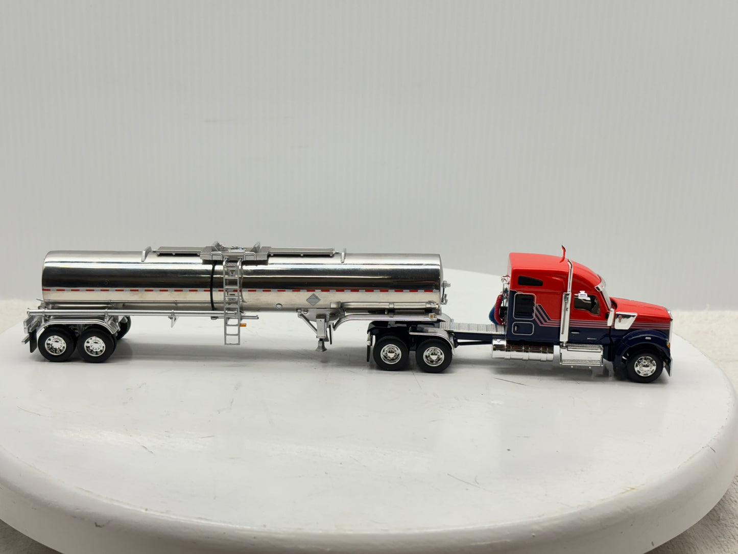 1/64 Kenworth W990 76'' Midroof (Orange-Blue)