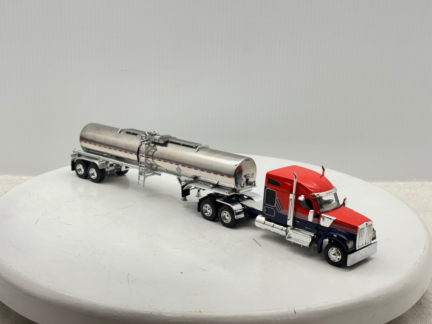 1/64 Kenworth W990 76'' Midroof (Orange-Blue)