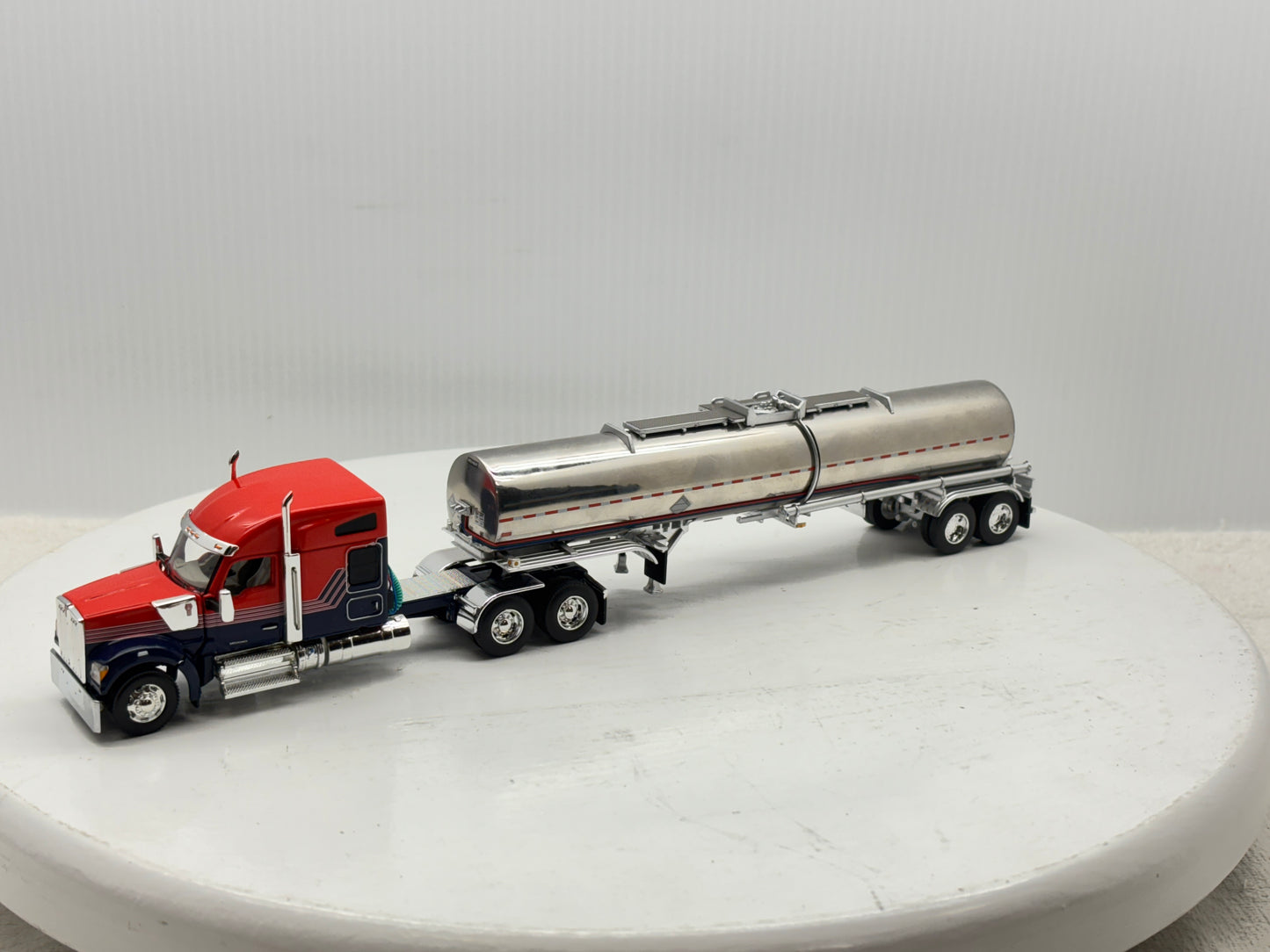 1/64 Kenworth W990 76'' Midroof (Orange-Blue)