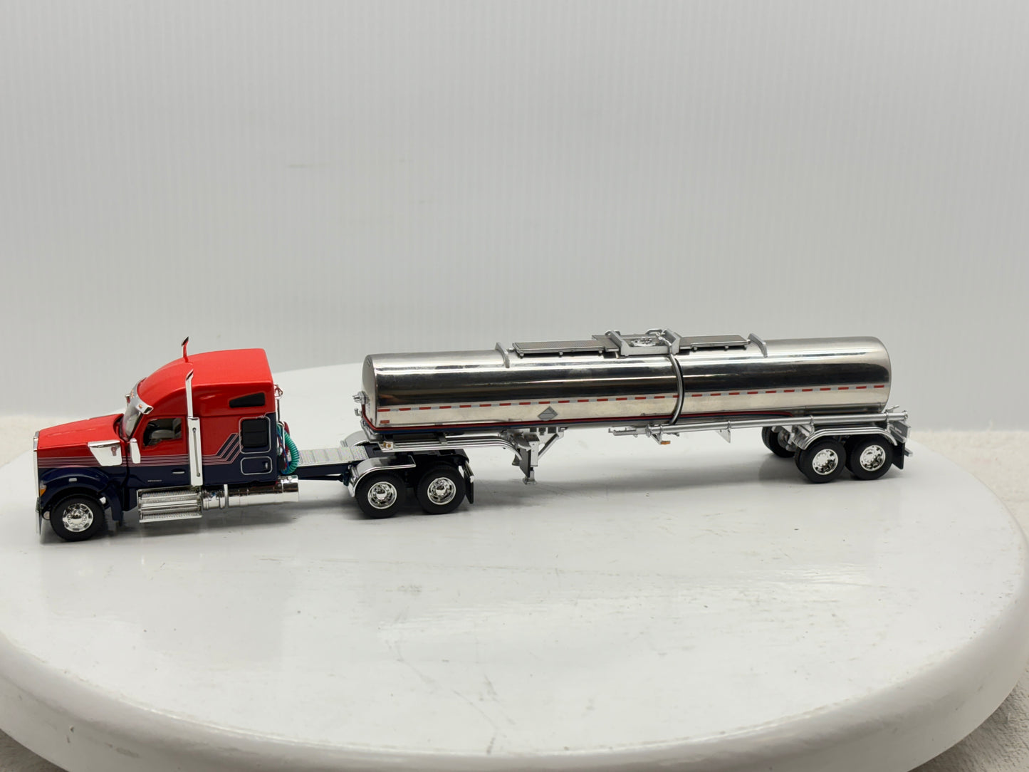 1/64 Kenworth W990 76'' Midroof (Orange-Blue)