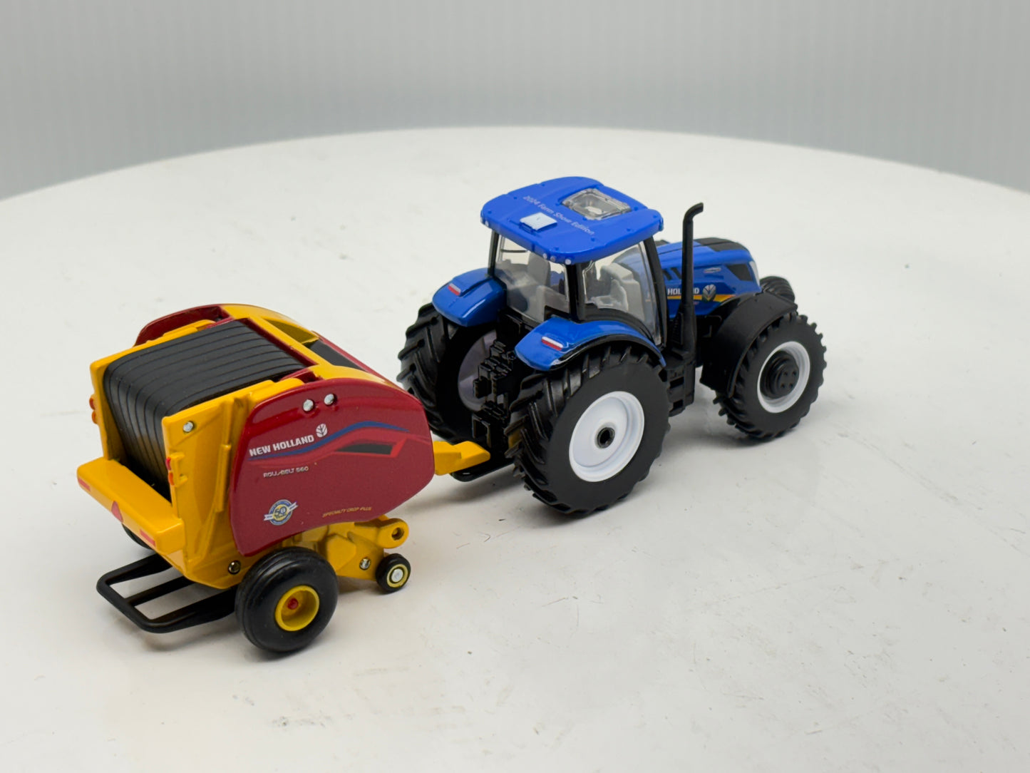 1/64 New Holland T6.180 - Roll-Belt 560