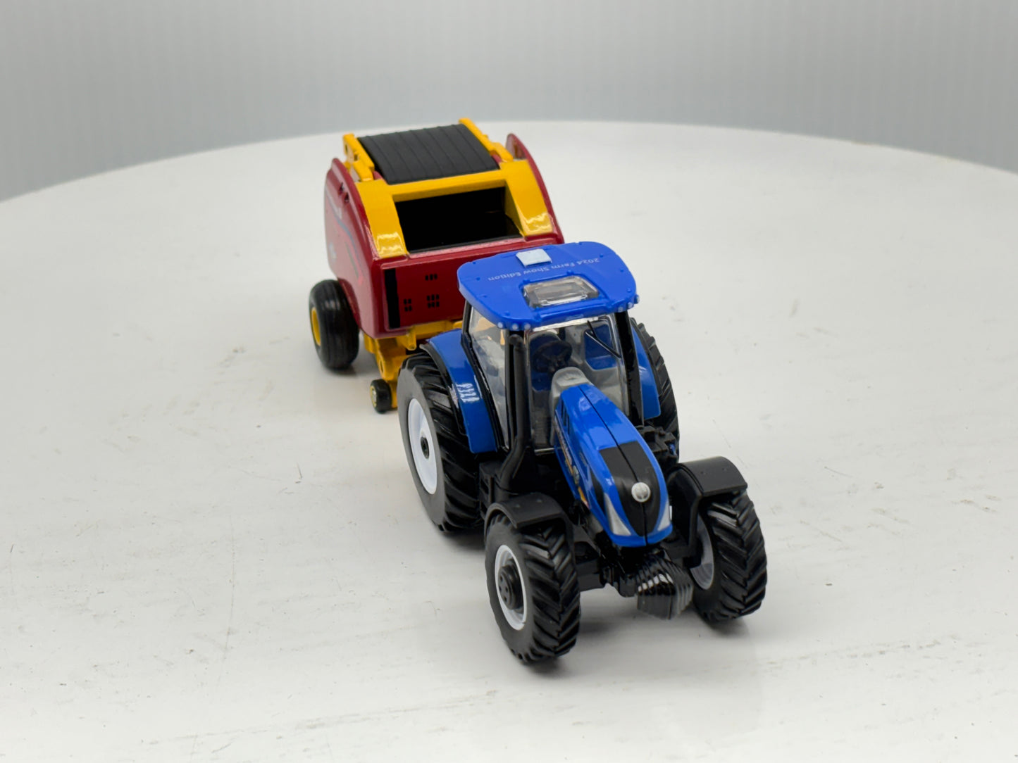 1/64 New Holland T6.180 - Roll-Belt 560