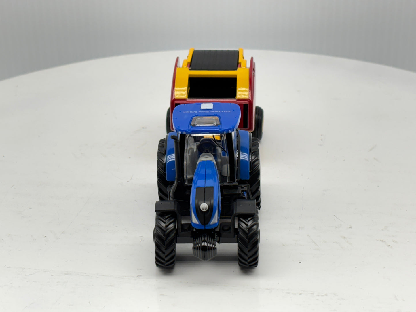 1/64 New Holland T6.180 - Roll-Belt 560