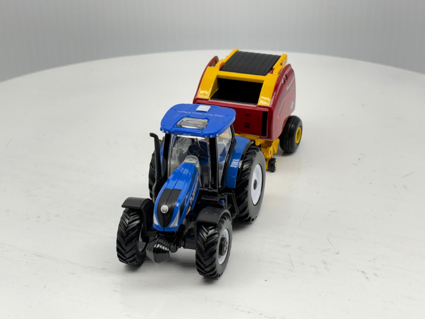 1/64 New Holland T6.180 - Roll-Belt 560
