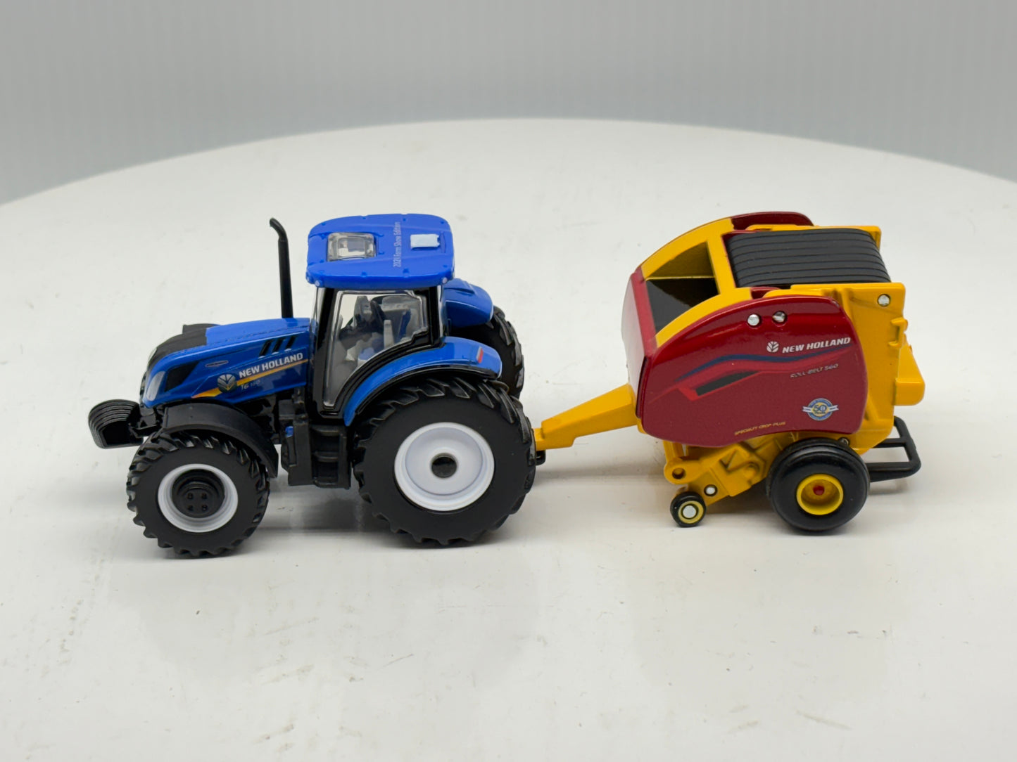 1/64 New Holland T6.180 - Roll-Belt 560
