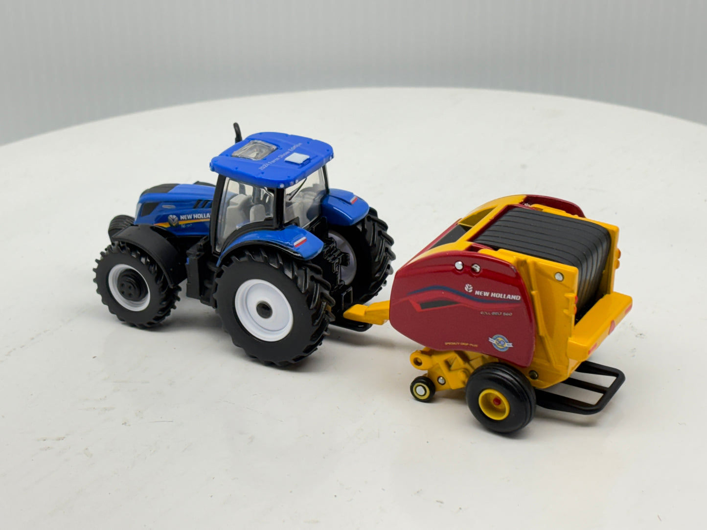 1/64 New Holland T6.180 - Roll-Belt 560