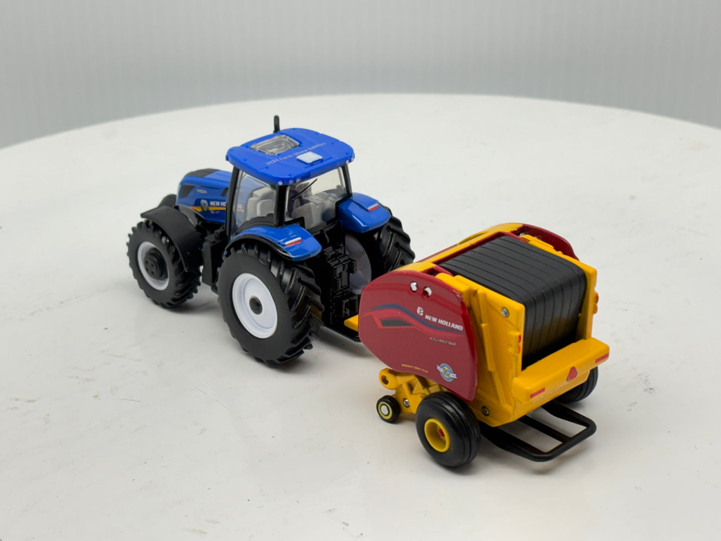 1/64 New Holland T6.180 - Roll-Belt 560