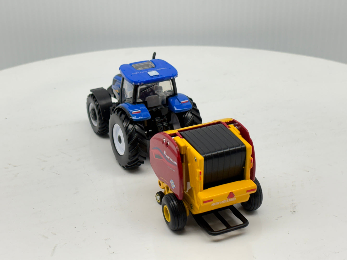 1/64 New Holland T6.180 - Roll-Belt 560