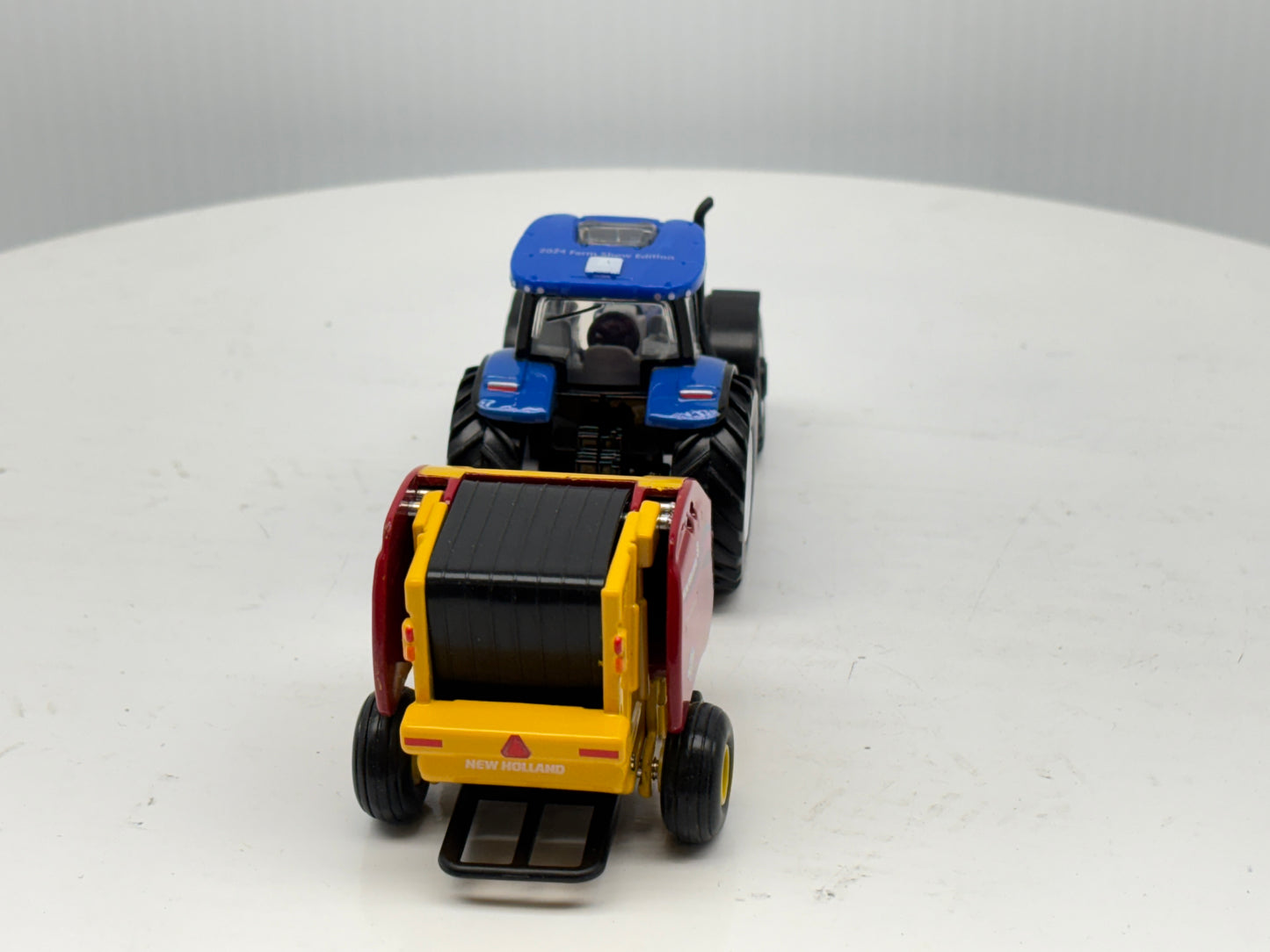 1/64 New Holland T6.180 - Roll-Belt 560