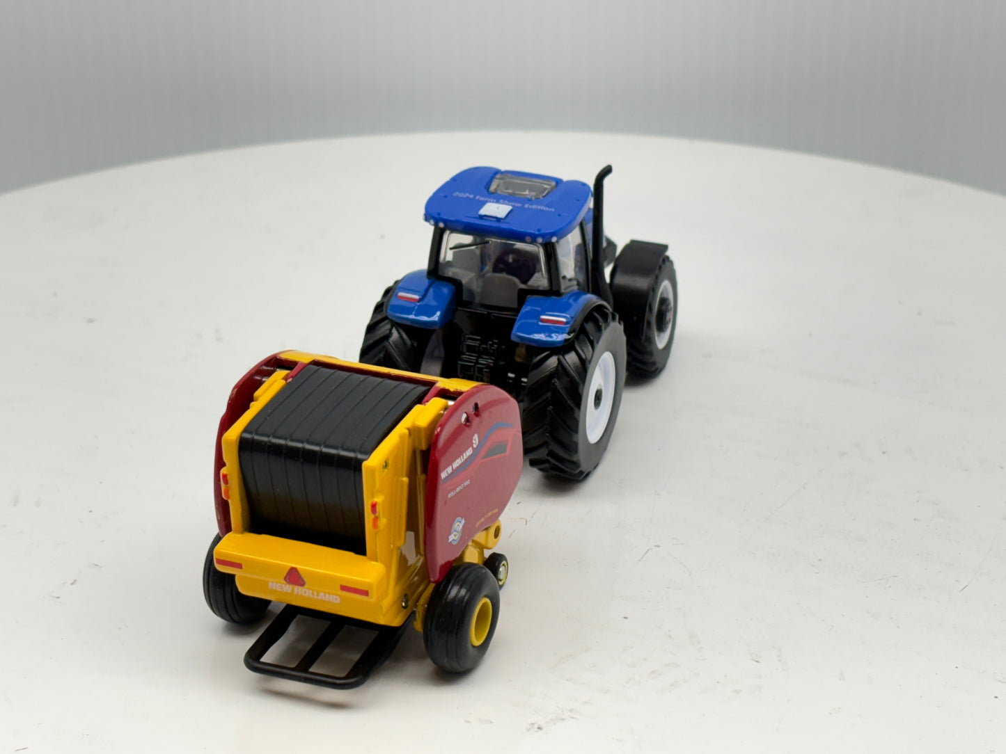 1/64 New Holland T6.180 - Roll-Belt 560