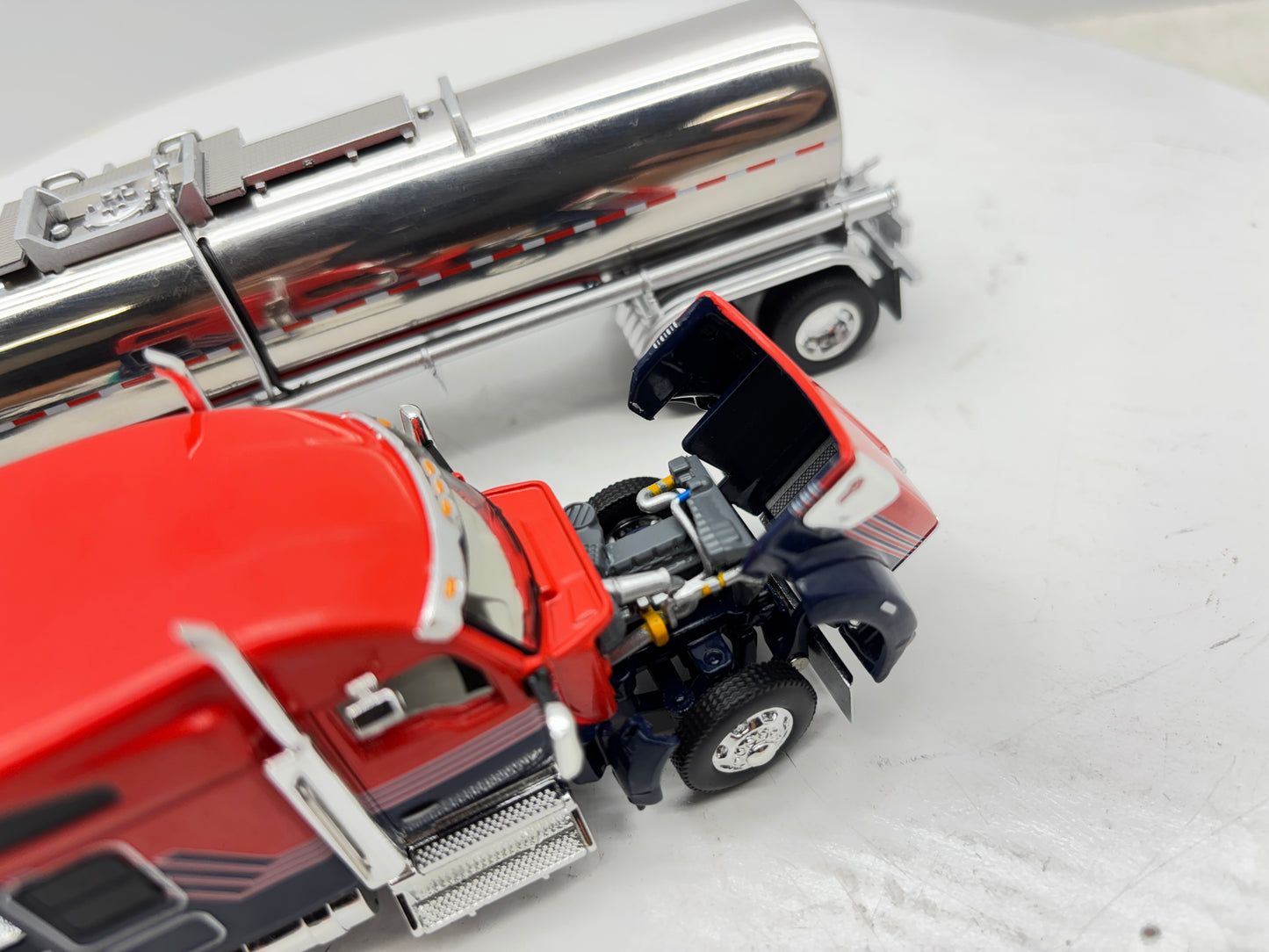 1/64 Kenworth W990 76'' Midroof (Orange-Blue)