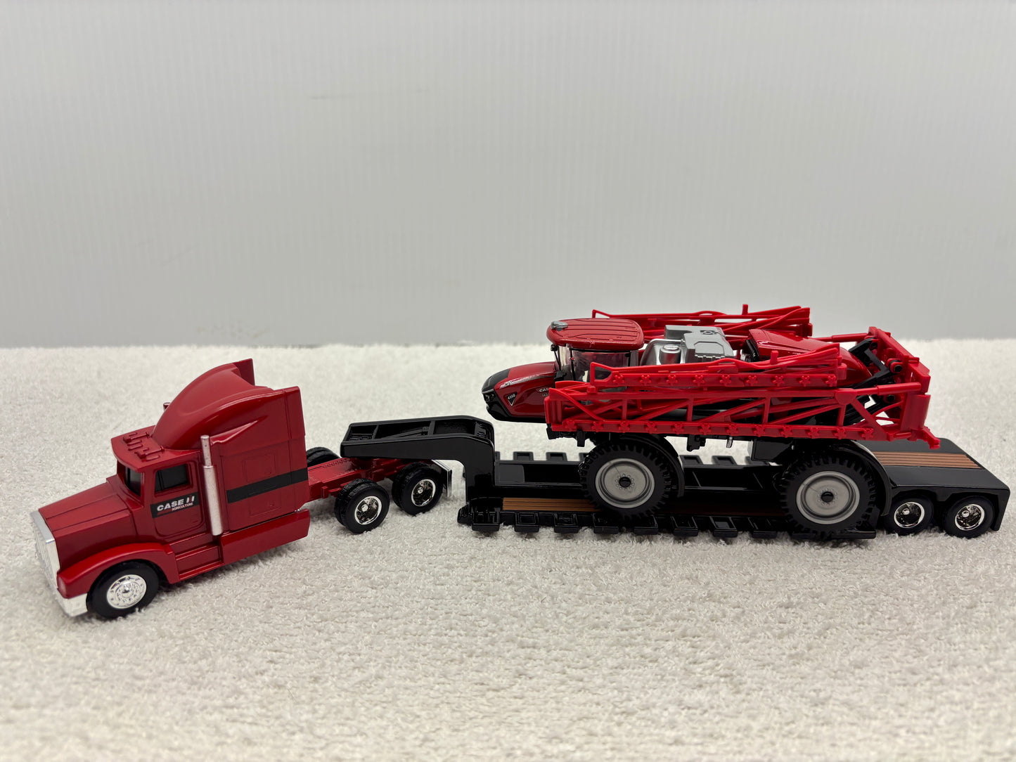 1/64 Case IH 4350 with Trucks and lowboy trailer