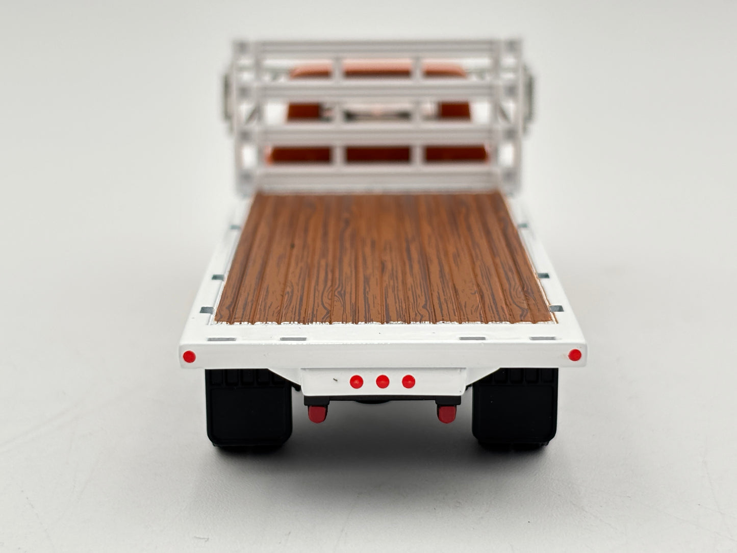 1/64 GMC 4000 Single Axle Flatbed Truck