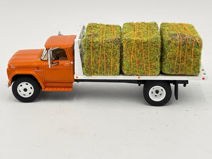 1/64 GMC 4000 Single Axle Flatbed Truck