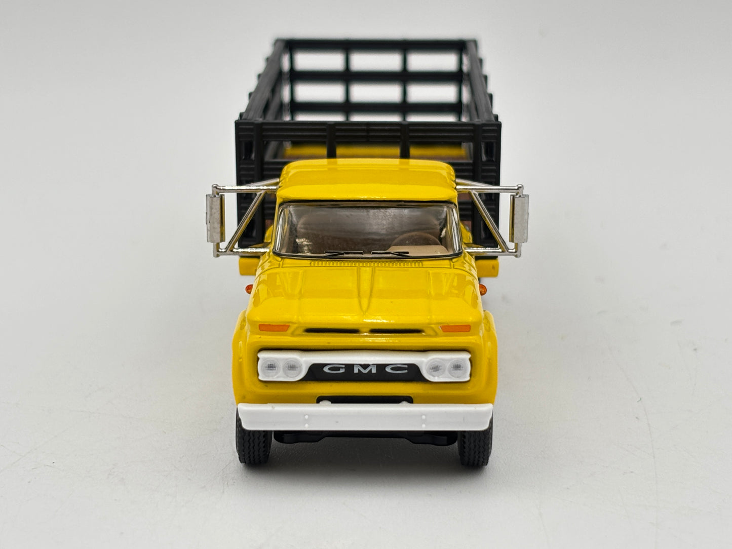 1/64 GMC 4000 Single Axle Stake Truck
