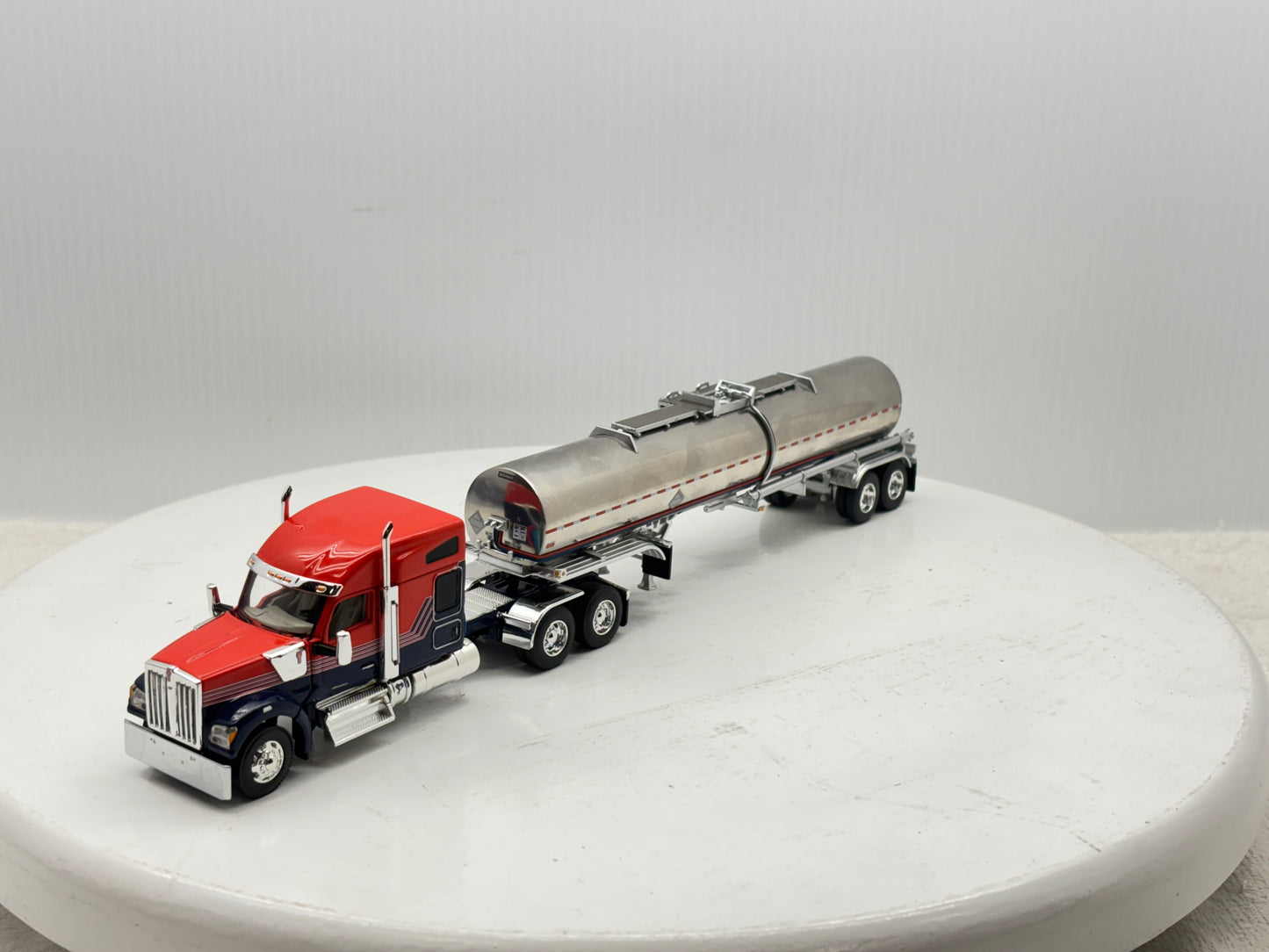 1/64 Kenworth W990 76'' Midroof (Orange-Blue)