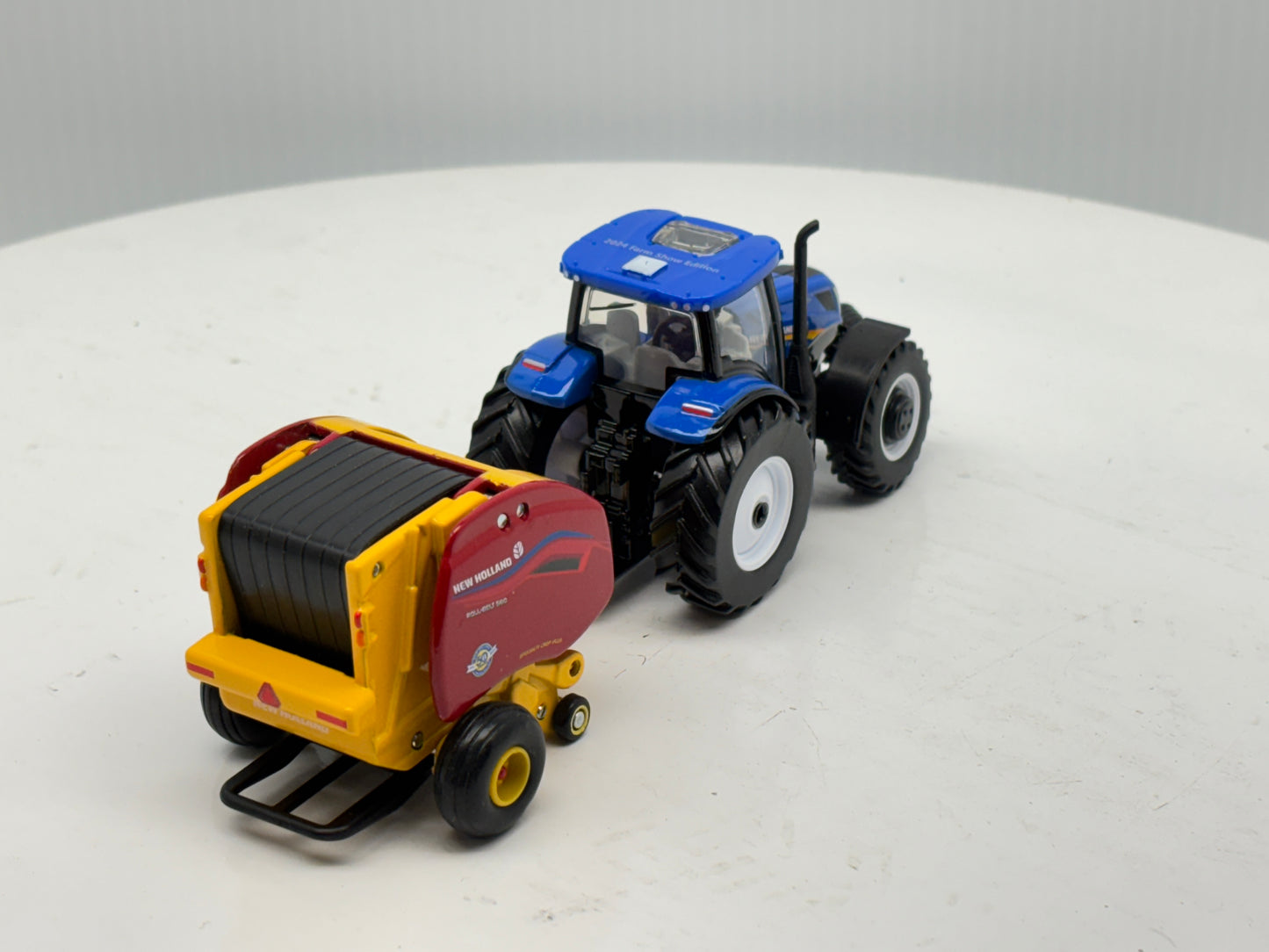 1/64 New Holland T6.180 - Roll-Belt 560