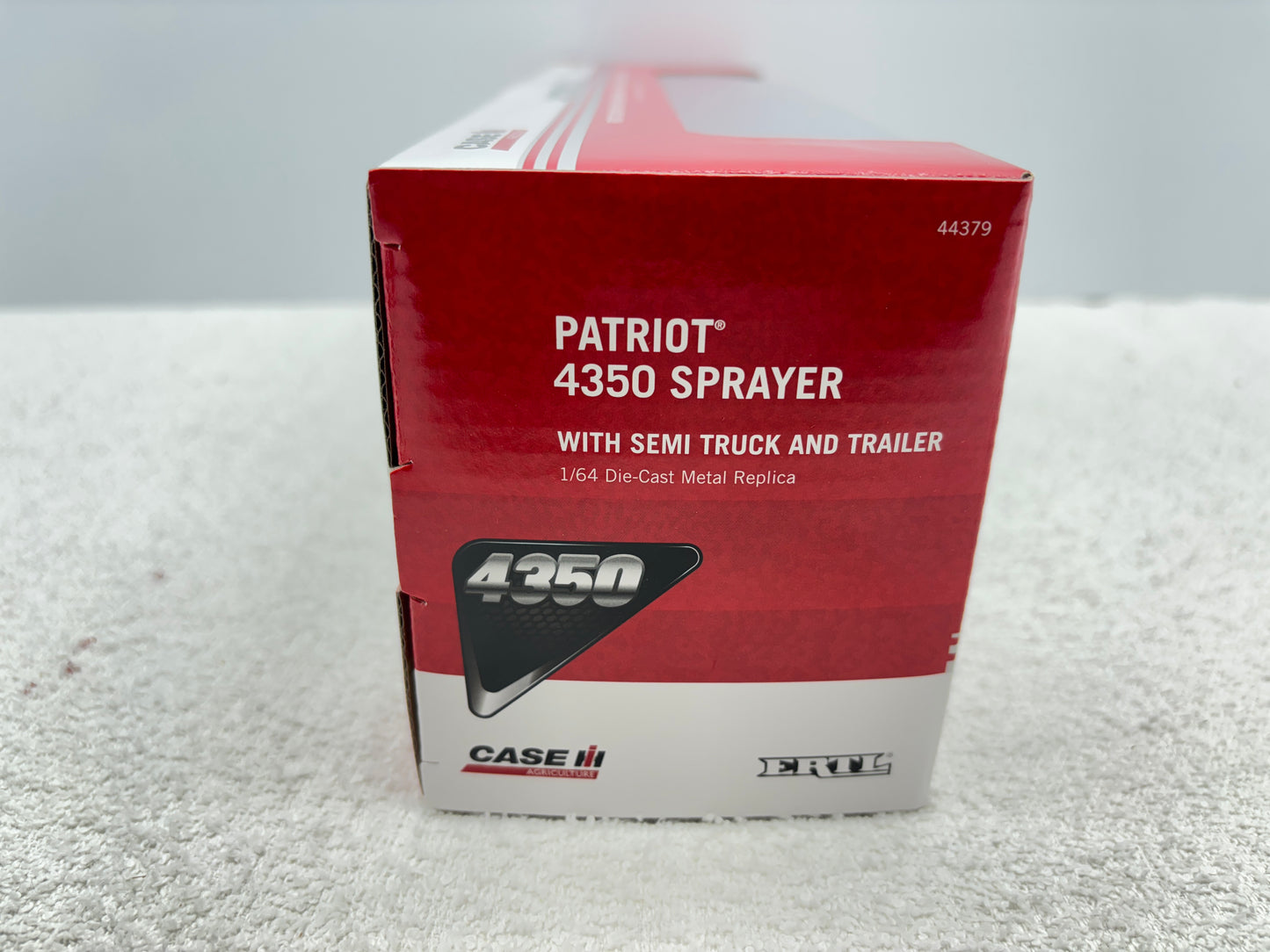 1/64 Case IH 4350 with Trucks and lowboy trailer